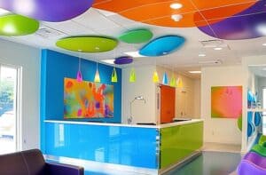 A vibrant, colorful waiting area for kids in an orthodontic office